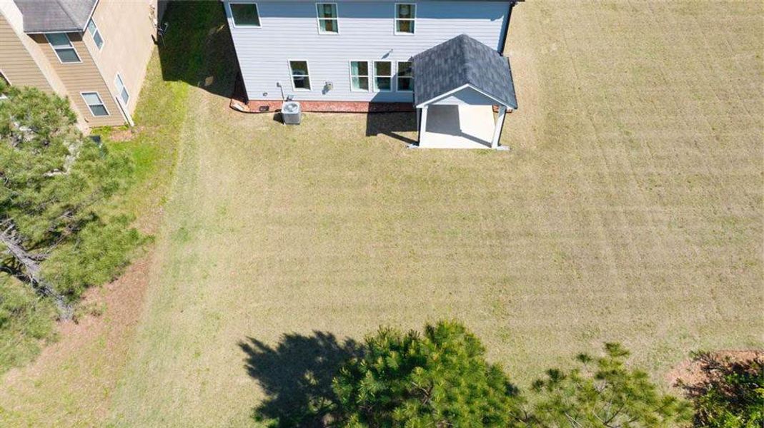 Exterior details and patio area of a home in Wildwood, Covington (Image 28). Exterior details and patio area of a home in Wildwood, Covington (Image 28).