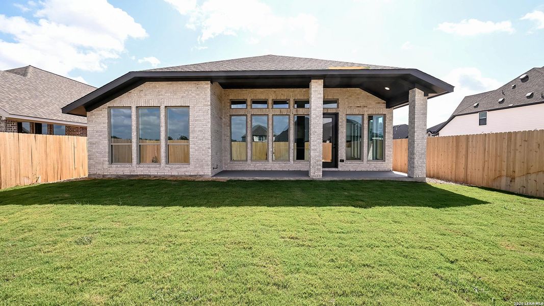 Exterior details and patio area of a home in Legacy at Lake Dunlap, New Braunfels (Image 4).