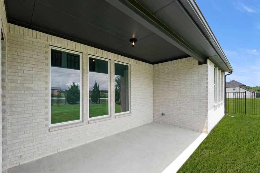 Exterior details and patio area of a home in Nelson Lake Estates, Rockwall (Image 21). Exterior details and patio area of a home in Nelson Lake Estates, Rockwall (Image 21).