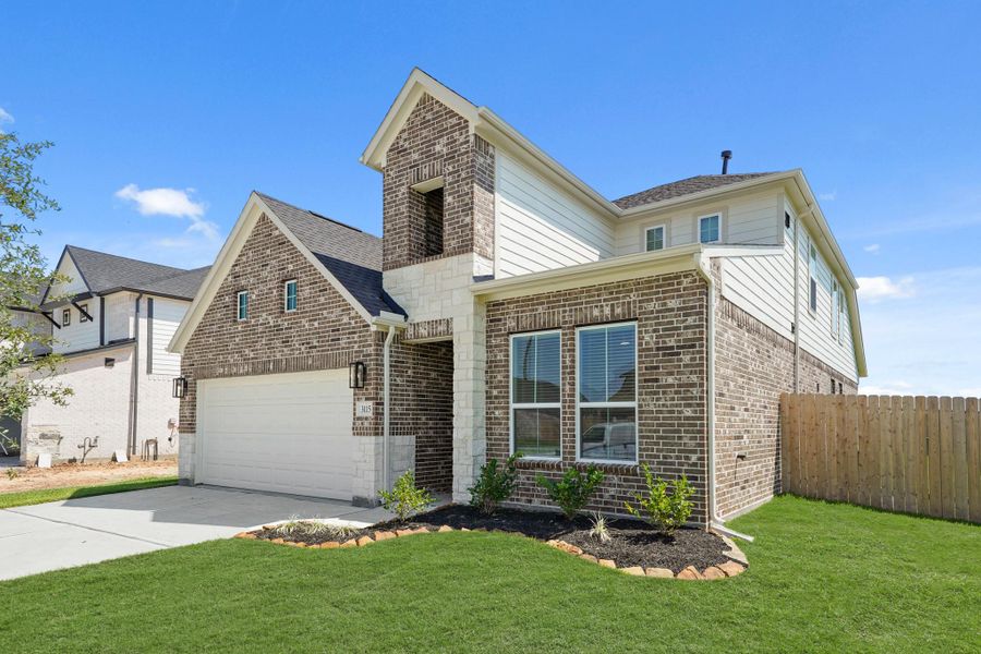Front exterior of a new home in Briarwood Crossing, Rosenberg, TX, highlighting curb appeal (Image 14).