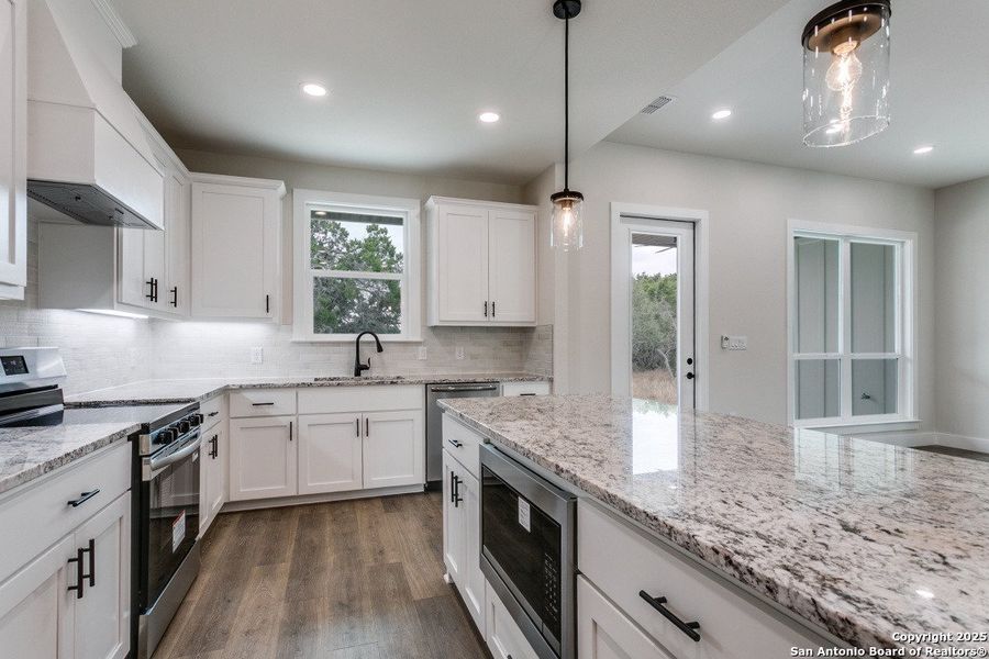 Furnished interior view inside a new home in , Fischer (Image 6). Furnished interior view inside a new home in , Fischer (Image 6).