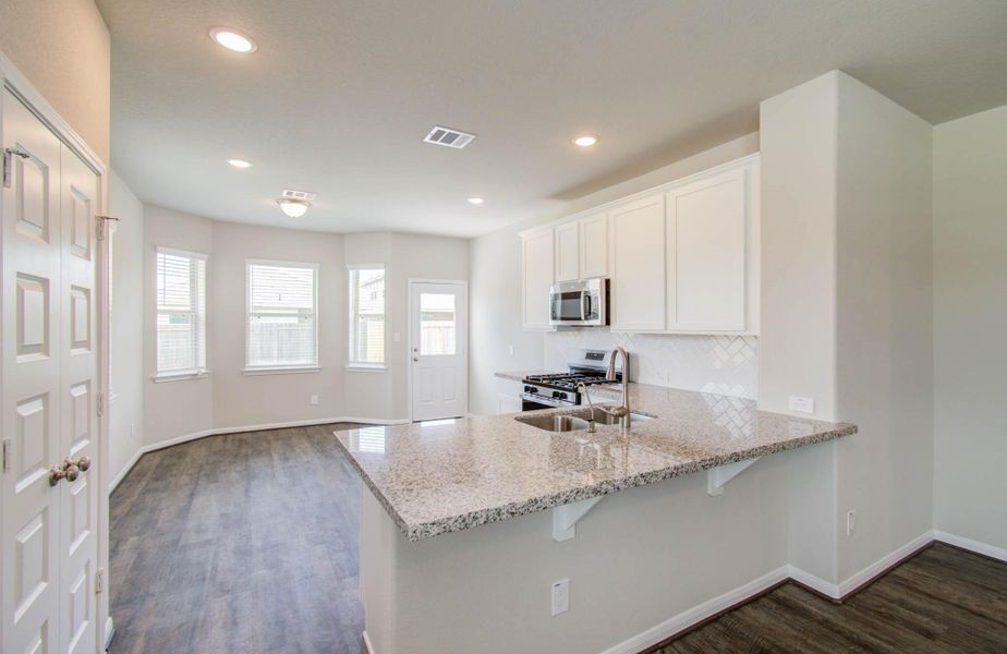 Furnished interior view inside a new home in Legends Bay, Baytown (Image 8).