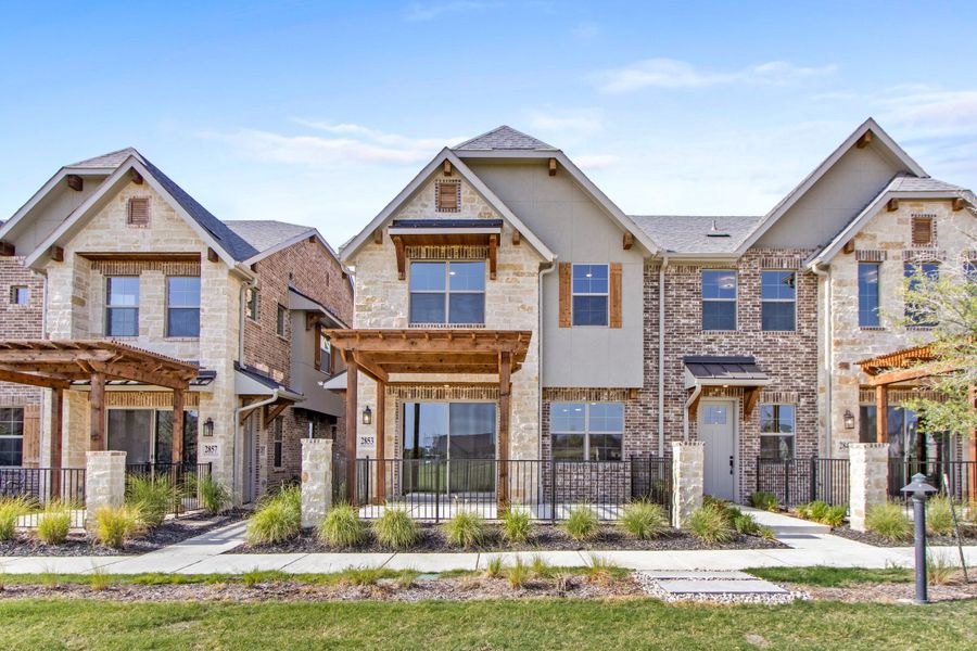 Front exterior of a new home in The Tribute, The Colony, TX, highlighting curb appeal (Image 1). Front exterior of a new home in The Tribute, The Colony, TX, highlighting curb appeal (Image 1).