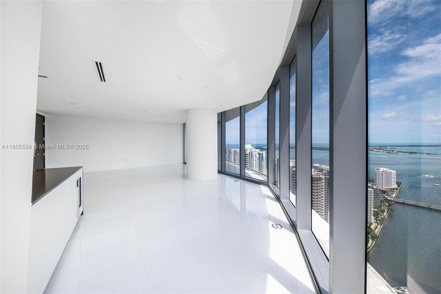 Spacious, unfurnished interior of a new home in Aston Martin Residences, Miami (Image 14).