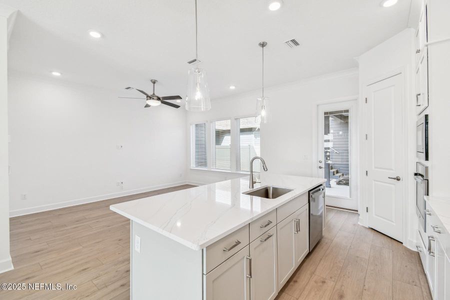 Furnished interior view inside a new home in Seven Pines 24' Rear Entry Townhomes, Jacksonville (Image 3).