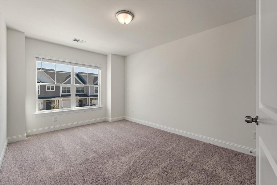 Spacious, unfurnished interior of a new home in The Landings at Montague, Goose Creek (Image 32).