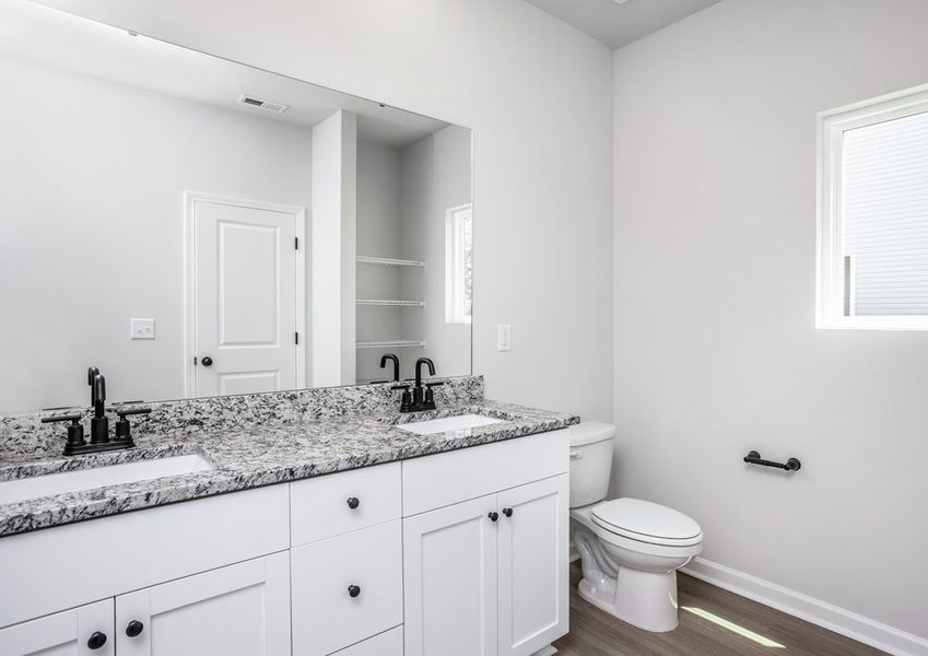 The master bathroom has dual sinks The master bathroom has dual sinks