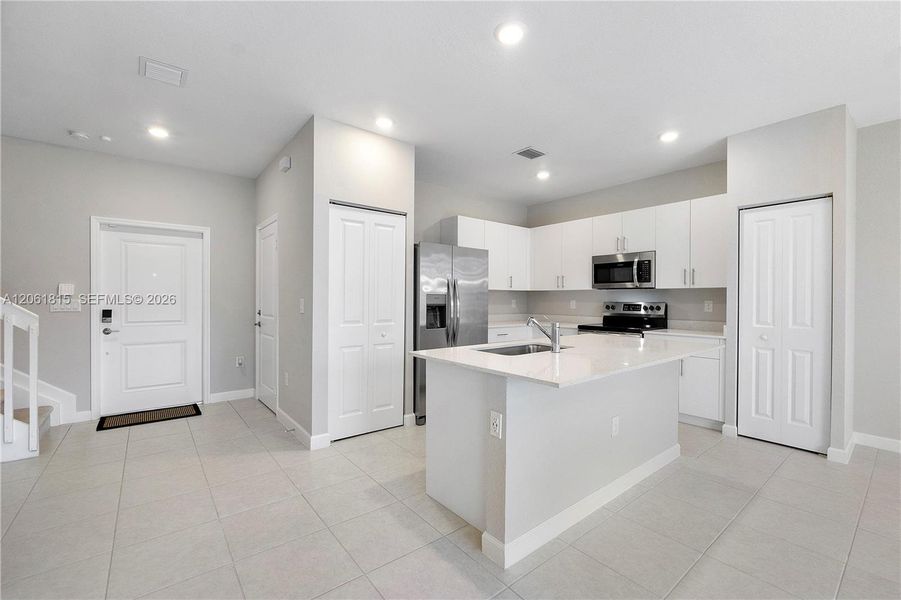 Furnished interior view inside a new home in , Coral Springs (Image 7).