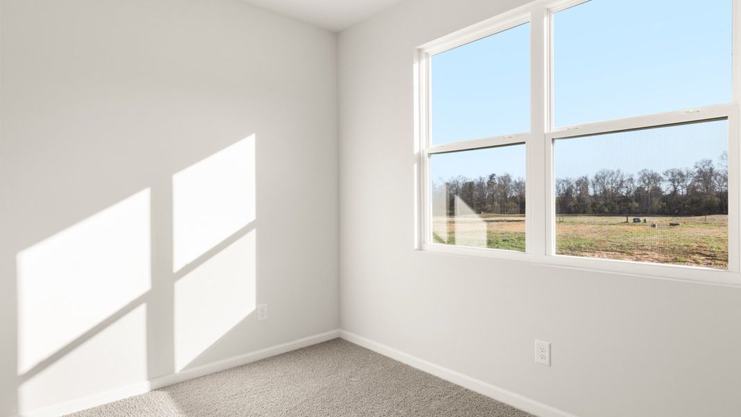Representative unfurnished interior of a home built from the Cali by D.R. Horton in Twin Lakes, Hoschton (Image 22).
