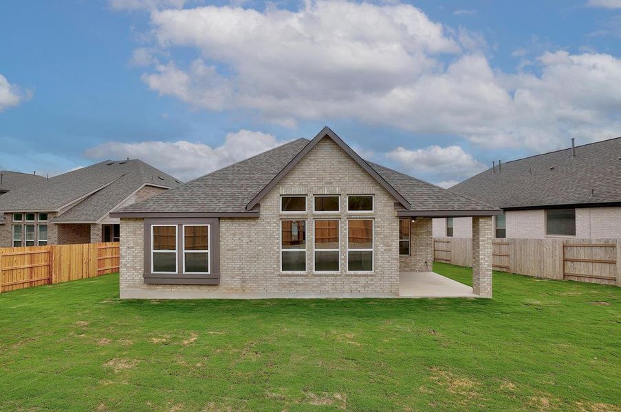 Front exterior of a new home in Parkside Peninsula, Georgetown, TX, highlighting curb appeal (Image 1). Front exterior of a new home in Parkside Peninsula, Georgetown, TX, highlighting curb appeal (Image 1).