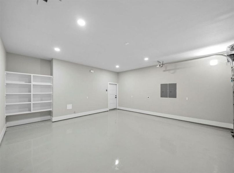 Garage with Built In's and Epoxy Flooring