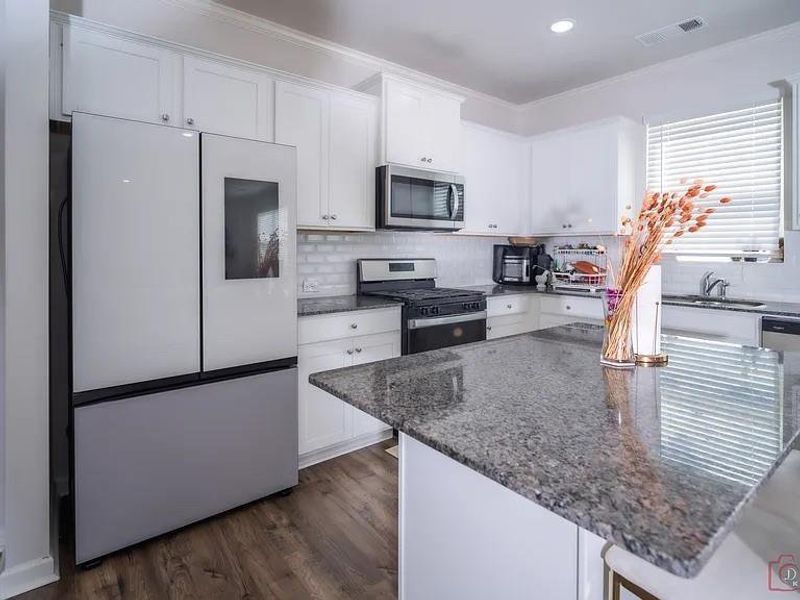 Furnished interior view inside a new home in , Cumming (Image 10).