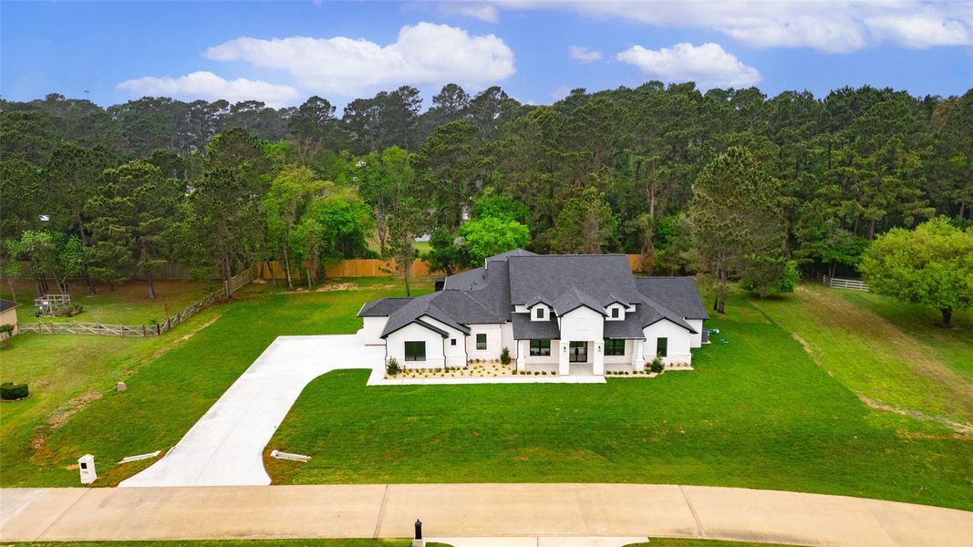 Front exterior of a new home in , Tomball, TX, highlighting curb appeal (Image 23).