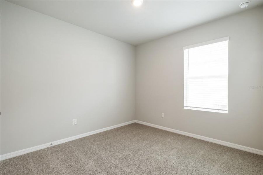 Spacious, unfurnished interior of a new home in Coral Lakes - Tradition & Express, Punta Gorda (Image 18). Spacious, unfurnished interior of a new home in Coral Lakes - Tradition & Express, Punta Gorda (Image 18).