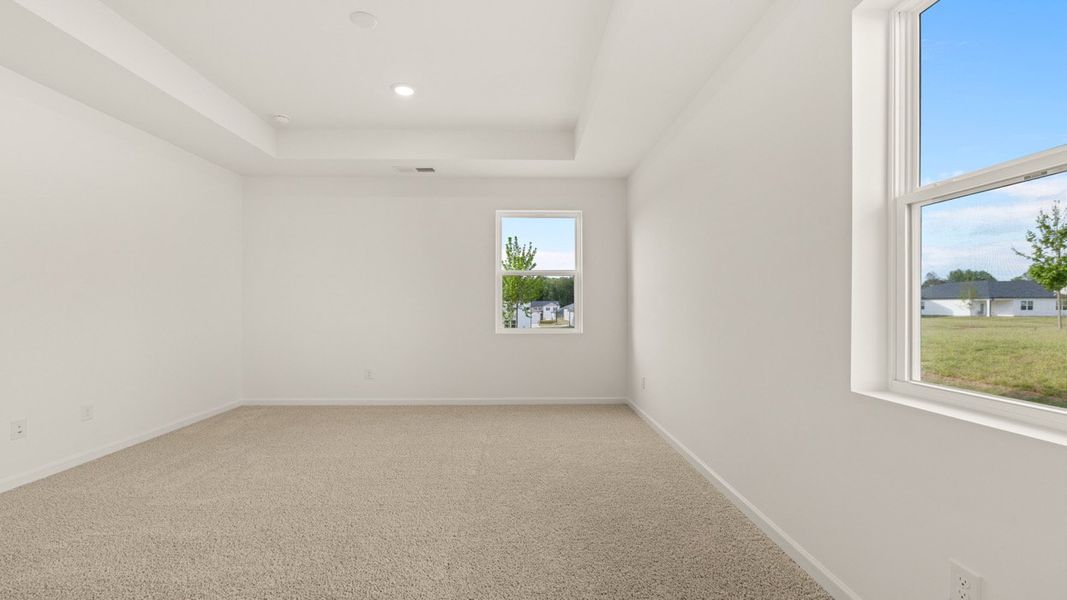 Representative unfurnished interior of a home built from the Kerry by D.R. Horton in Champion's Run, Lithonia (Image 9).
