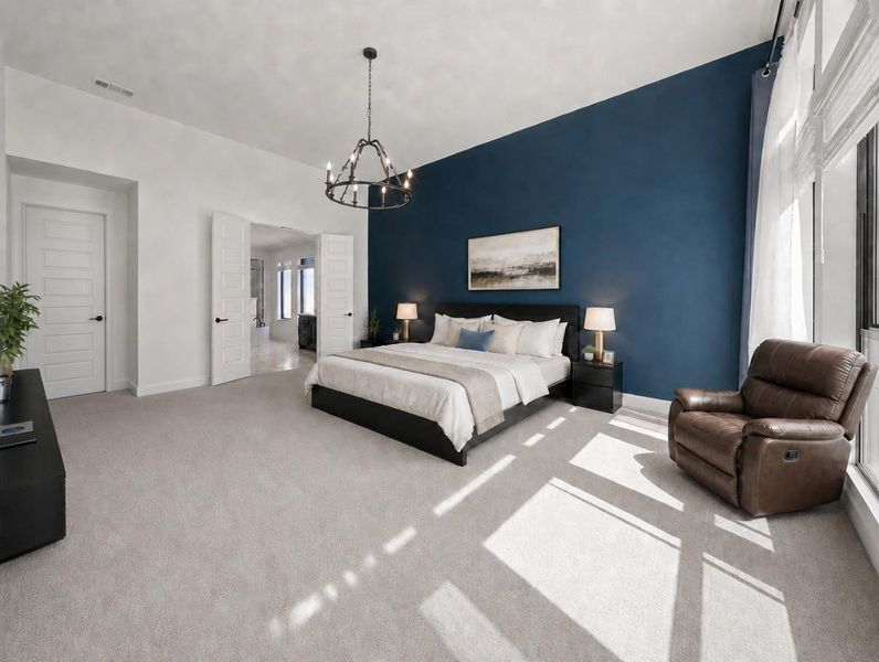 A spacious primary bedroom features a striking accent wall, plush carpet, and abundant natural light. A spacious primary bedroom features a striking accent wall, plush carpet, and abundant natural light.