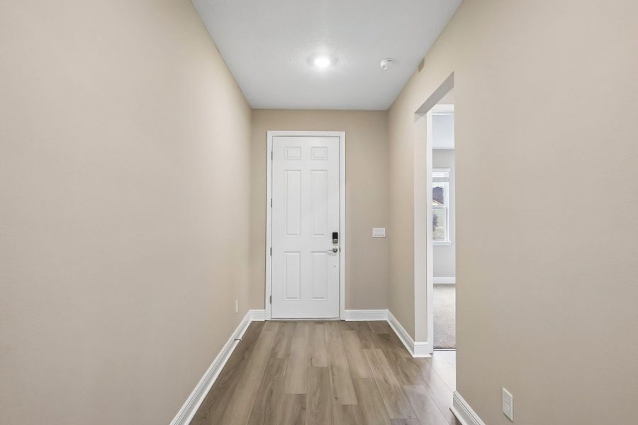 Spacious, unfurnished interior of a new home in Legends Preserve - Signature Series, Daytona Beach (Image 9).