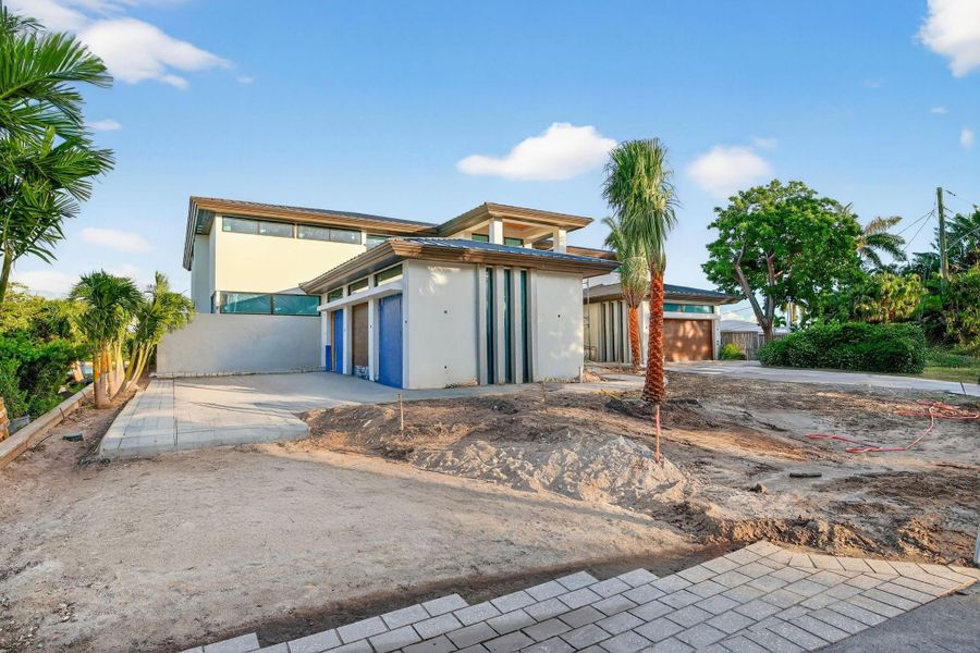 Front exterior of a new home in , Fort Lauderdale, FL, highlighting curb appeal (Image 1).