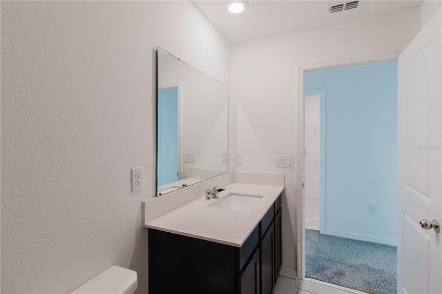 Furnished interior view inside a new home in Peace Creek Reserve, Winter Haven (Image 13). Furnished interior view inside a new home in Peace Creek Reserve, Winter Haven (Image 13).