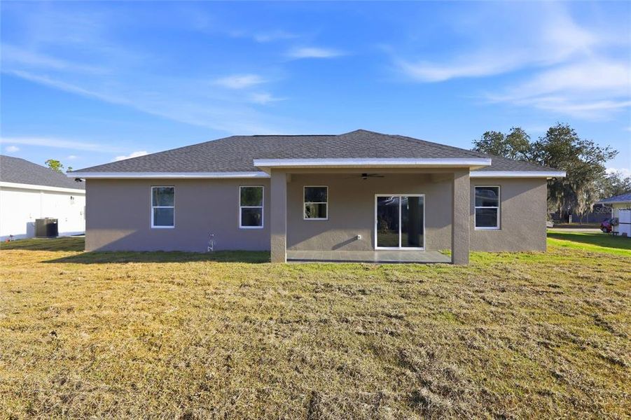 Exterior details and patio area of a home in , Sebring (Image 3).