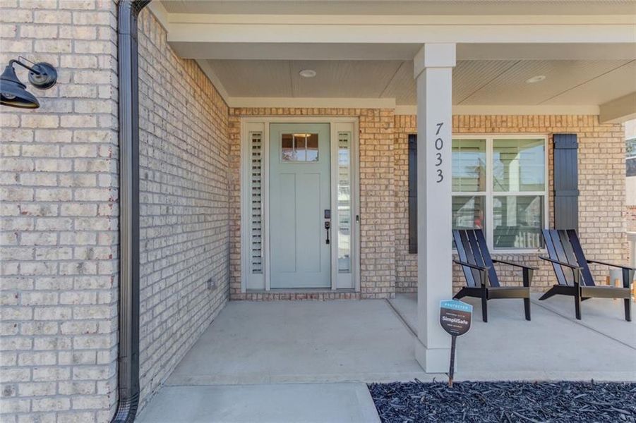 Exterior details and patio area of a home in Cambridge, Flowery Branch (Image 22).