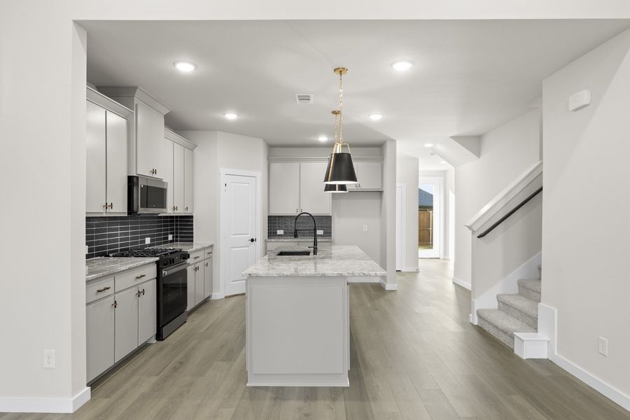 Furnished interior view inside a new home in Willow Grove Single-Family Homes, Melissa (Image 10).