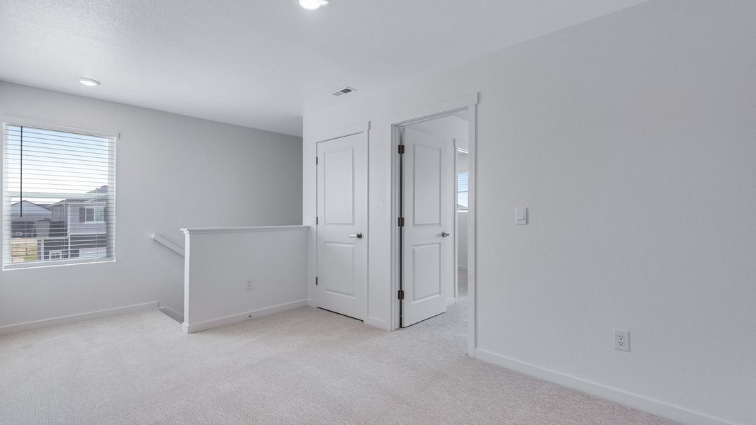 Spacious, unfurnished interior of a new home in Prairie Song, Windsor (Image 18).