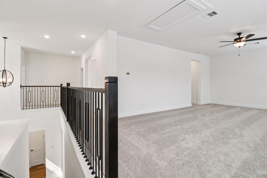 Spacious, unfurnished interior of a new home in The Highlands, Porter (Image 28).
