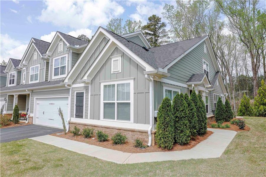 Front exterior of a new home in , Cumming, GA, highlighting curb appeal (Image 27). Front exterior of a new home in , Cumming, GA, highlighting curb appeal (Image 27).