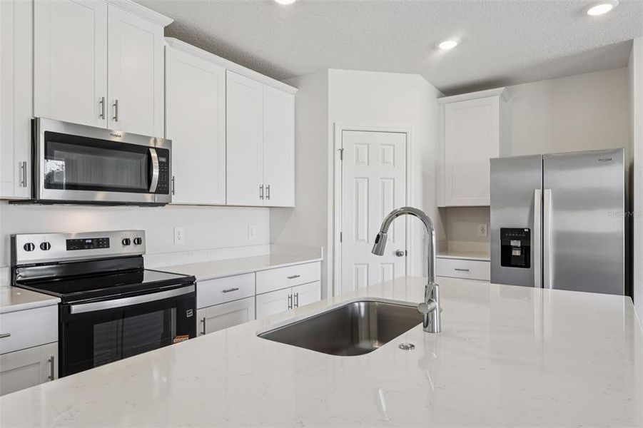Furnished interior view inside a new home in Bradbury Creek - Signature Series, Haines City (Image 7).