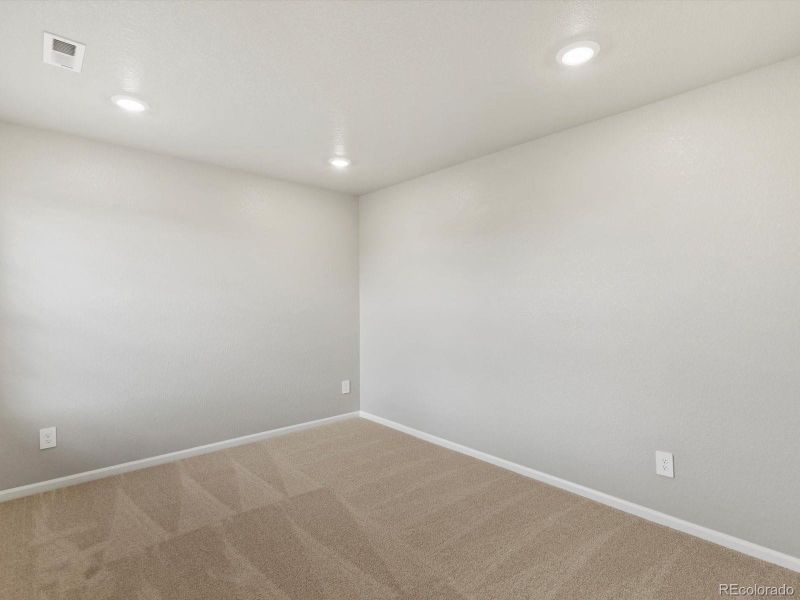 Spacious, unfurnished interior of a new home in Ridgeline Vista: The Flora Collection, Brighton (Image 24). Spacious, unfurnished interior of a new home in Ridgeline Vista: The Flora Collection, Brighton (Image 24).