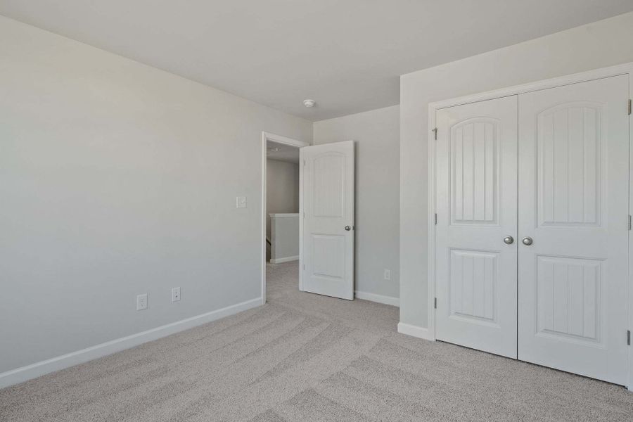 Representative unfurnished interior of a home built from the Camellia by Caviness & Cates Communities in Bartlett Manor, Youngsville (Image 109).