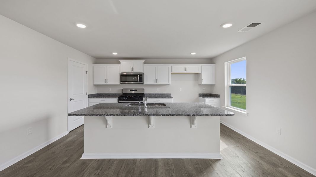 Furnished interior view inside a new home in Lightwood Cottages, Moore (Image 6).