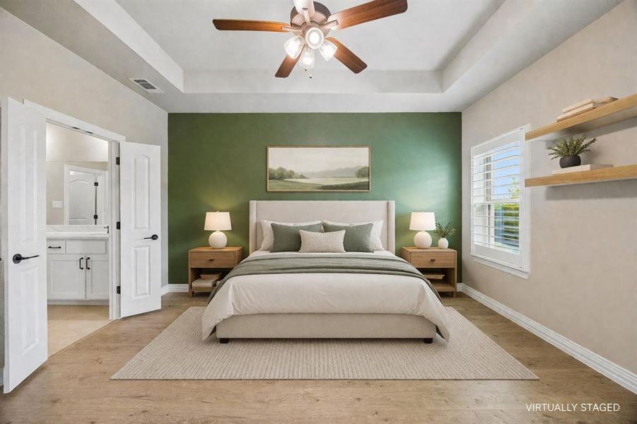 This primary suite is captivating. It has open shelving on the walls with an ensuite bath. This primary suite is captivating. It has open shelving on the walls with an ensuite bath.