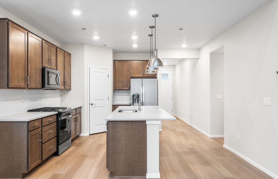 Furnished interior view inside a new home in Harvest Crossing, Aurora (Image 11).