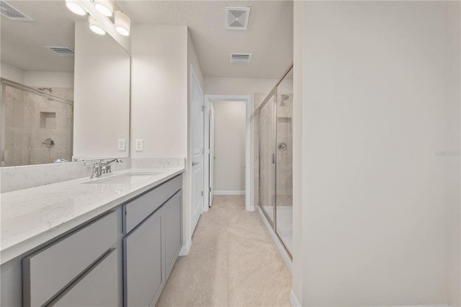 Furnished interior view inside a new home in EverBe, Orlando (Image 10).