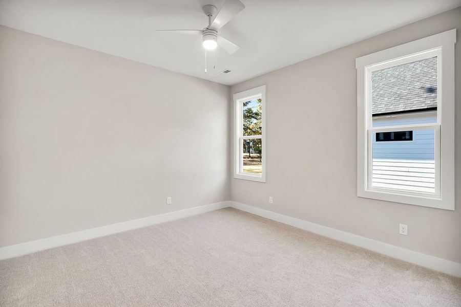 Spacious, unfurnished interior of a new home in The Bluffs On the Cape Fear, Leland (Image 24).