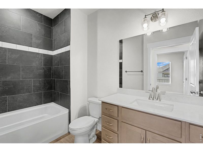 Furnished interior view inside a new home in Highlands at Fox Hill - The Flats, Longmont (Image 6).