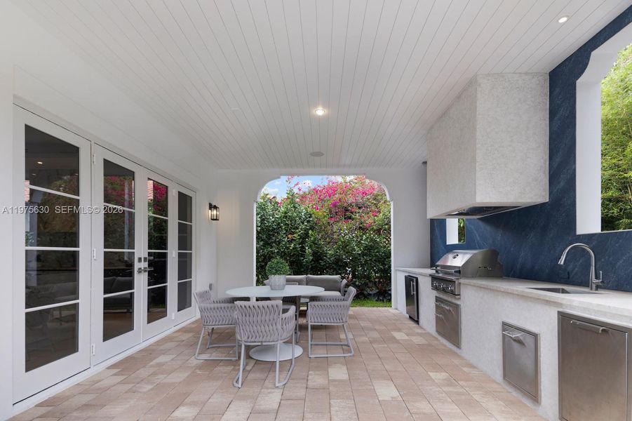 Exterior details and patio area of a home in , Coral Gables (Image 3).