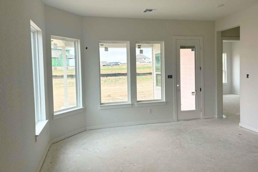 In-progress construction of a new home in The Grove at Blackhawk, Pflugerville, TX (Image 26).