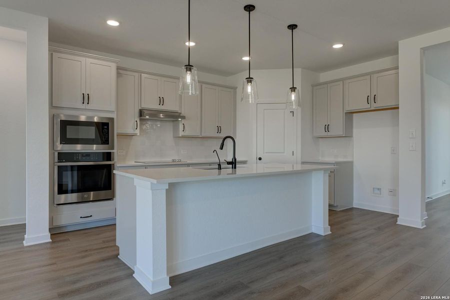 Furnished interior view inside a new home in Nopal Valley, San Antonio (Image 6).
