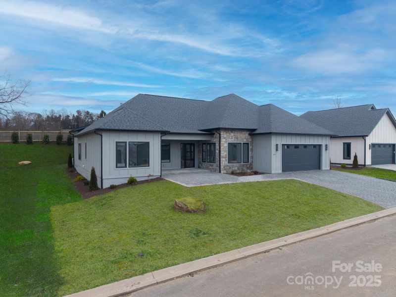 Front exterior of a new home in , Arden, NC, highlighting curb appeal (Image 21).