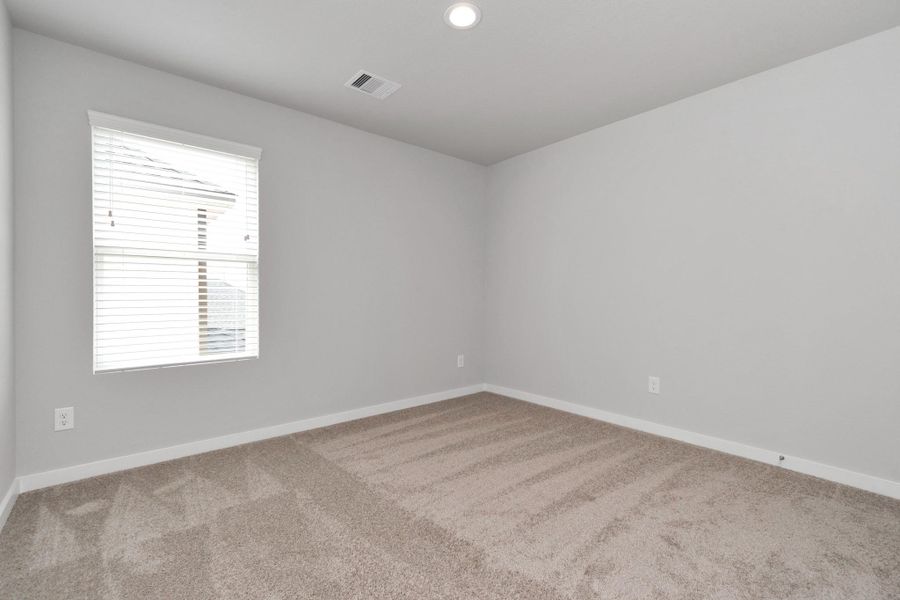 Guest suite. Sample photo of completed home with similar floor plan. Actual colors and selections may vary.