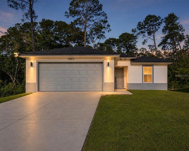 Front exterior of a new home in , Deland, FL, highlighting curb appeal (Image 22).
