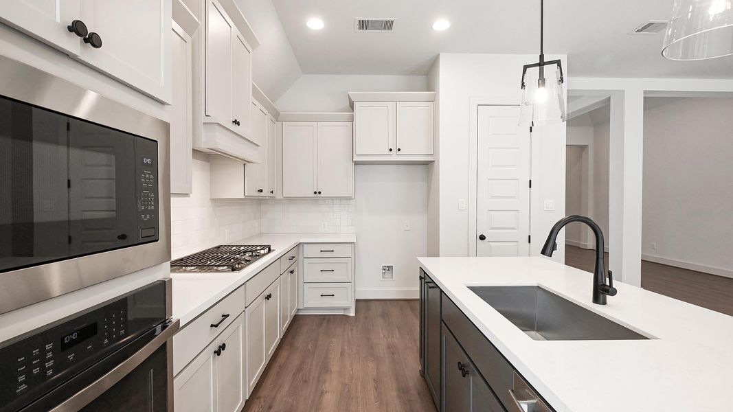 Furnished interior view inside a new home in Crosswinds, Kyle (Image 10).