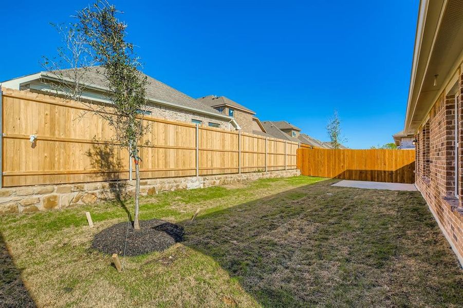 Exterior details and patio area of a home in Summerwood Estates, Red Oak (Image 4).