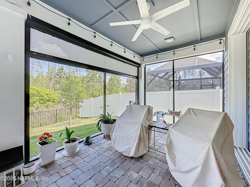 Exterior details and patio area of a home in Hawthorn Park at Wildlight, Yulee (Image 22).