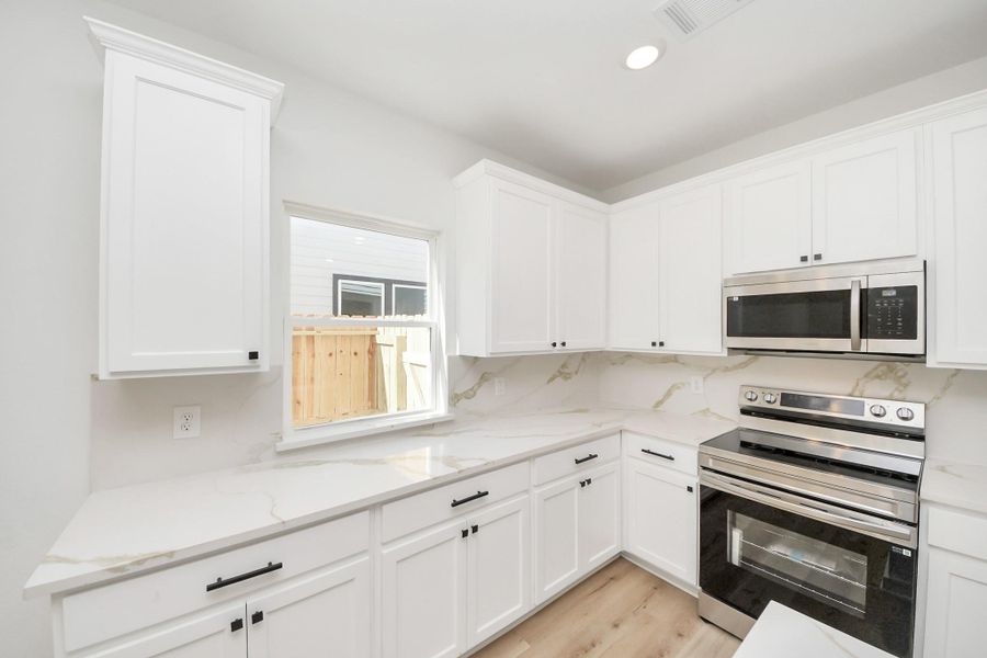 Furnished interior view inside a new home in , Houston (Image 18).