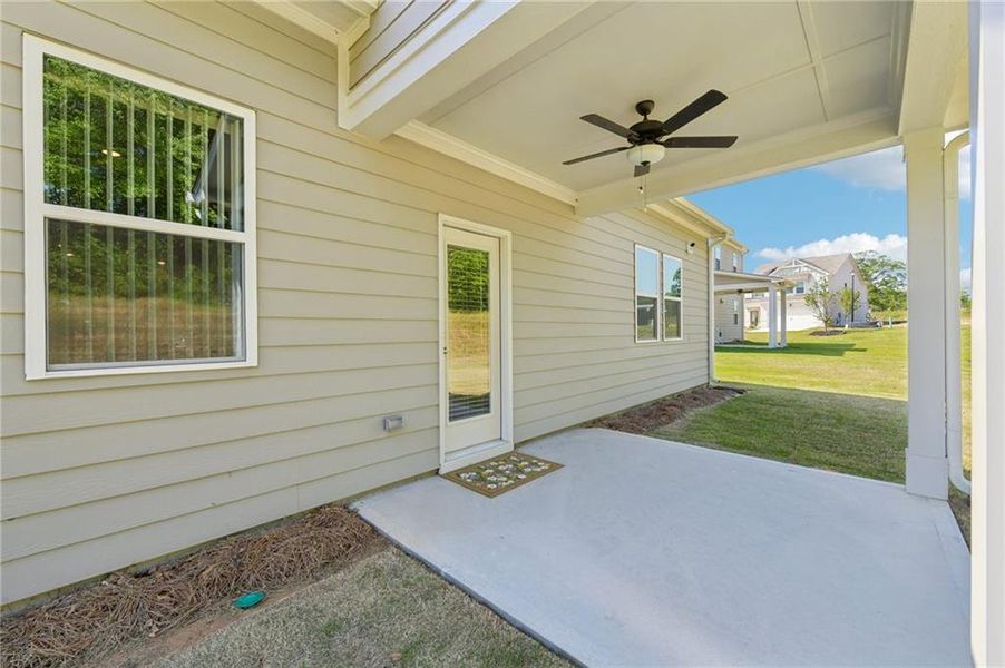 Exterior details and patio area of a home in Windance Lake, Loganville (Image 20).