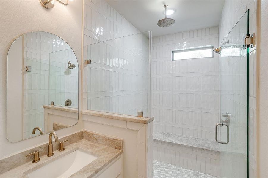 High-end Delta plumbing fixtures complement sleek stone and organic textures. High-end Delta plumbing fixtures complement sleek stone and organic textures.